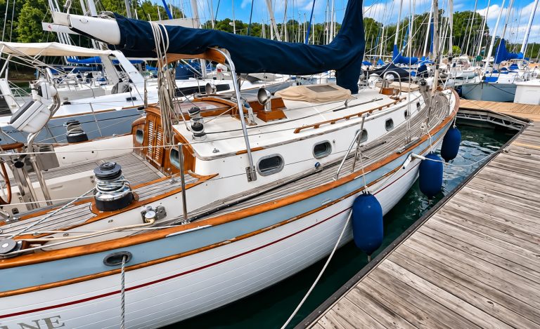 Classic wood trim sailboat at marina